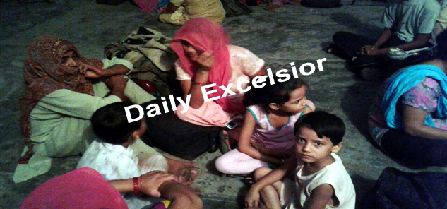 Border dwellers of Hiranagar sector taking shelter at Government Higher Secondary School, Hiranagar after Pak shelling