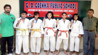 Goenkans posing with their medals won in North Zone CBSE Judo Cluster, held at New Delhi. Goenkans posing with their medals won in North Zone CBSE Judo Cluster, held at New Delhi.