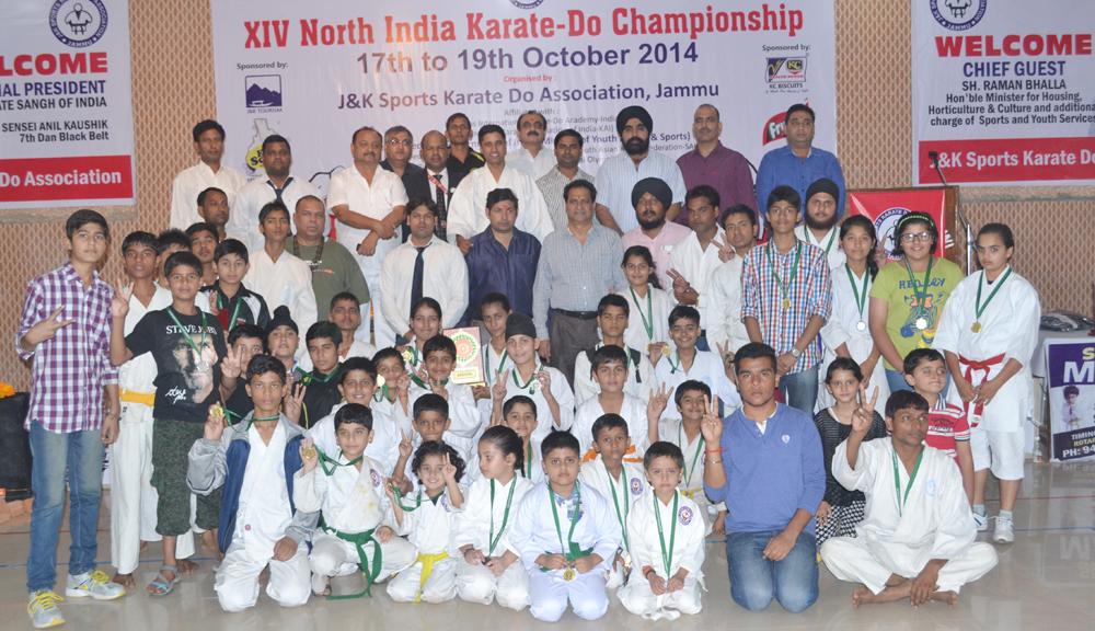 Winners of XIV North India Karate Do Championship 2014, posing for a group photograph with dignitaries at Jammu. Winners of XIV North India Karate Do Championship 2014, posing for a group photograph with dignitaries at Jammu.
