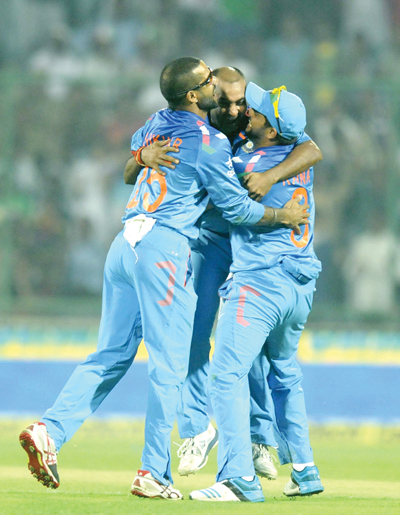 Indian players celebrating after taking wicket of West Indies player at New Delhi on Saturday. Indian players celebrating after taking wicket of West Indies player at New Delhi on Saturday.