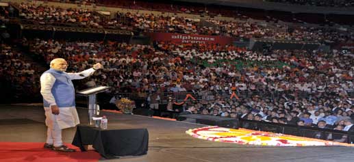 Prime Minister Narendra Modi addressing a gathering at the Community Reception, at Allphones Arena in Sydney, Australia on Monday. (UNI)