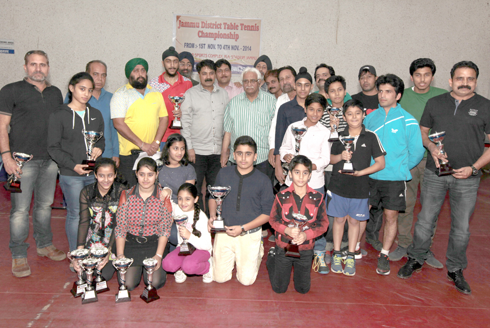 The winners and runners-up peddlers posing for a group photograph along with the chief guest, Vijay Bakaya at Indoor Hall, MA Stadium in Jammu. —Excelsior/Rakesh The winners and runners-up peddlers posing for a group photograph along with the chief guest, Vijay Bakaya at Indoor Hall, MA Stadium in Jammu. —Excelsior/Rakesh