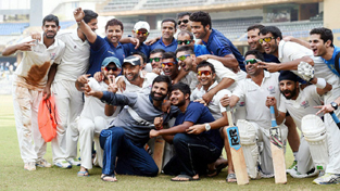 Jammu & Kashmir players celebrate after defeating 40-time champions Mumbai in the Ranji Trophy Group A match at the Wankhede Stadium on Wednesday. Jammu & Kashmir players celebrate after defeating 40-time champions Mumbai in the Ranji Trophy Group A match at the Wankhede Stadium on Wednesday.