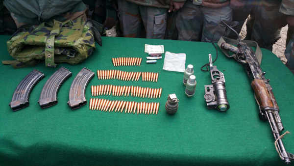 Arms and ammunition recovered from slain LeT militant in Sopore on Wednesday. -Excelsior/ Aabid Nabi