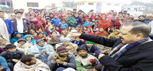 Union Minister in PMO, Dr Jitendra Singh addressing border migrants at Chadwal Camp on Wednesday.— Excelsior/Madan