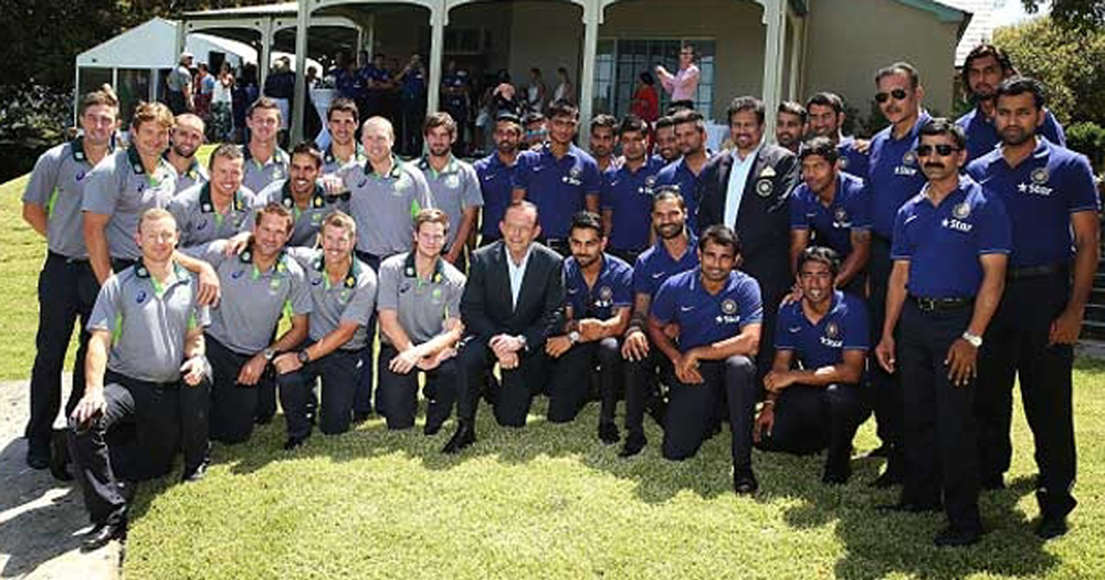 Team India and Australian Cricket Team posing alongwith Australian PM, Tony Abbott during High Tea. Team India and Australian Cricket Team posing alongwith Australian PM, Tony Abbott during High Tea.