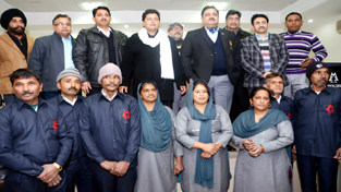 MLA Jammu East Rajesh Gupta, Commissioner, JMC Kiran Wattal and other officers of JMC posing with Safaikaracharis after distributing uniforms among them on Tuesday. MLA Jammu East Rajesh Gupta, Commissioner, JMC Kiran Wattal and other officers of JMC posing with Safaikaracharis after distributing uniforms among them on Tuesday.