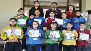 Students of KCIS who excelled in the National Science and Cyber Olympiad, posing along with School Principal Dr Ravi Bhushan and staff members n Monday. Students of KCIS who excelled in the National Science and Cyber Olympiad, posing along with School Principal Dr Ravi Bhushan and staff members n Monday.