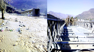 A portion of SK Bridge (L) which washed away in flood at Poonch on Thursday. Restored bridge after Sept 2014 floods is also seen (R). -Excelsior/Harbhajan A portion of SK Bridge (L) which washed away in flood at Poonch on Thursday. Restored bridge after Sept 2014 floods is also seen (R). -Excelsior/Harbhajan
