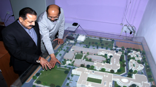 Union DoNER Minister Dr Jitendra Singh inspecting the model and site of the proposed hostel for Northeast students in the campus of Ramanujan College in New Delhi on Wednesday. Union DoNER Minister Dr Jitendra Singh inspecting the model and site of the proposed hostel for Northeast students in the campus of Ramanujan College in New Delhi on Wednesday.