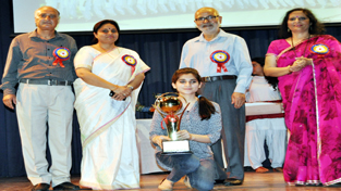 Minister for Education Naeem Akhtar and Minister of State for Education, Priya Sethi posing for group photograph after presenting trophy to meritorious students at GCW Gandhi Nagar in Jammu. Minister for Education Naeem Akhtar and Minister of State for Education, Priya Sethi posing for group photograph after presenting trophy to meritorious students at GCW Gandhi Nagar in Jammu.