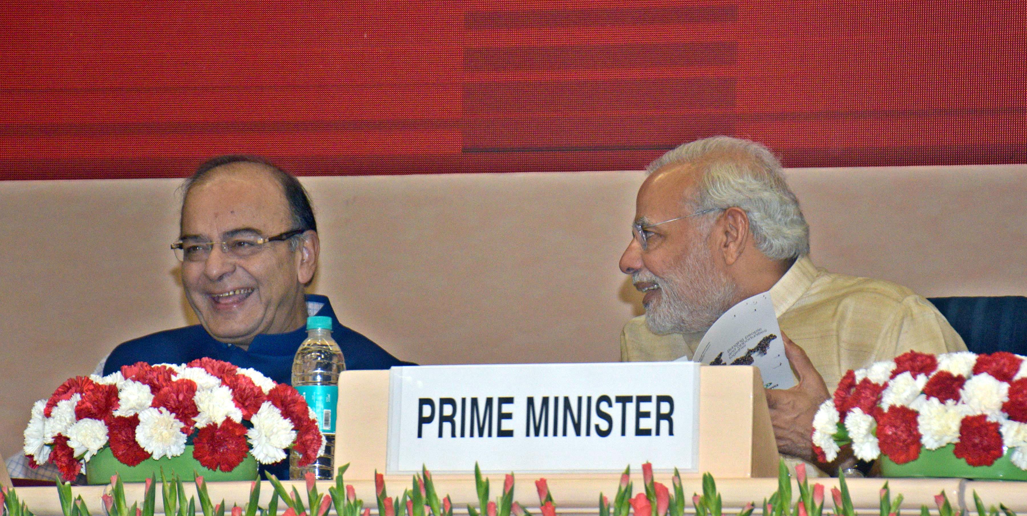 Prime Minister Narendra Modi in conversation with Union Finance Minister Arun Jaitley at the 46th session of Indian Labour Conference in New Delhi on Monday. (UNI) Prime Minister Narendra Modi in conversation with Union Finance Minister Arun Jaitley at the 46th session of Indian Labour Conference in New Delhi on Monday. (UNI)