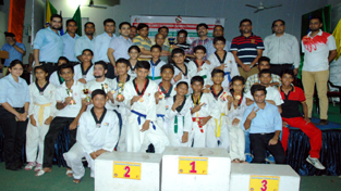 Winners posing alongwith dignitaries during the concluding ceremony of Taekwondo Championship. Winners posing alongwith dignitaries during the concluding ceremony of Taekwondo Championship.