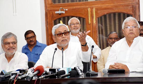 Chief Minister Nitish Kumar with RJD chief Lalu Prasad and Bihar Congress incharge C P Joshi jointly addressing a press conference in Patna on Wednesday. (UNI) Chief Minister Nitish Kumar with RJD chief Lalu Prasad and Bihar Congress incharge C P Joshi jointly addressing a press conference in Patna on Wednesday. (UNI)