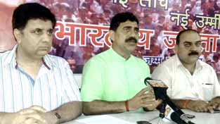 BJP State president, Jugal Kishore Sharma along with other BJP leaders addressing media persons at Party headquarters in Jammu. BJP State president, Jugal Kishore Sharma along with other BJP leaders addressing media persons at Party headquarters in Jammu.