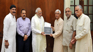 BJP leaders from J&K submitting memorandum to Prime Minister Narendra Modi at New Delhi on Thursday. BJP leaders from J&K submitting memorandum to Prime Minister Narendra Modi at New Delhi on Thursday.