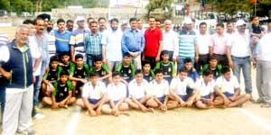 Players posing alongwith dignitaries during Inter-District Sports Meet at Rajouri on Tuesday. Players posing alongwith dignitaries during Inter-District Sports Meet at Rajouri on Tuesday.