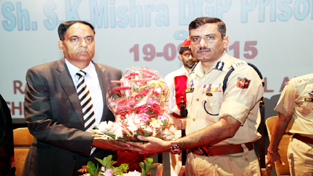 Director Police Academy Rajesh Kumar presenting a bouquet to DGP (Prison) S K Mishra during valedictory function of training programme for KAs Probationers on Saturday. Director Police Academy Rajesh Kumar presenting a bouquet to DGP (Prison) S K Mishra during valedictory function of training programme for KAs Probationers on Saturday.
