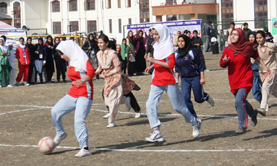 Young girl controling the ball through dribling and weaving soccer skills during Girls Sports Festival in Srinagar. Young girl controling the ball through dribling and weaving soccer skills during Girls Sports Festival in Srinagar.