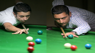 Cueists Nikhil Kapahi and Sohail Khalid in action during a quarterfinal match of Jammu District Senior Snooker Championship at MA Stadium in Jammu on Tuesday. —Excelsior/Rakesh Cueists Nikhil Kapahi and Sohail Khalid in action during a quarterfinal match of Jammu District Senior Snooker Championship at MA Stadium in Jammu on Tuesday. —Excelsior/Rakesh