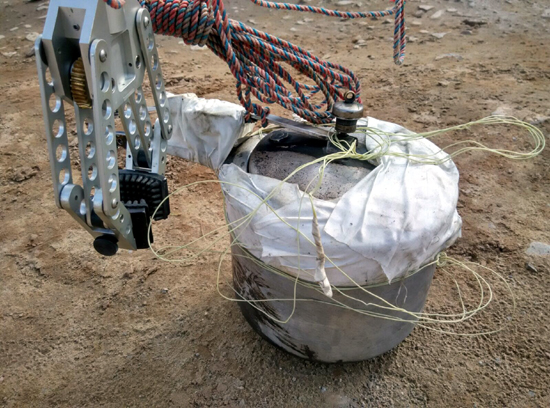 Troops using robotic arm to defuse cooker IED in Mendhar on Sunday. Troops using robotic arm to defuse cooker IED in Mendhar on Sunday.