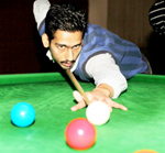 Cueist aiming at the target in the quarterfinals of Senior Snooker at Billiards Hall, MA Stadium, Jammu on Friday. -Excelsior/Rakesh Cueist aiming at the target in the quarterfinals of Senior Snooker at Billiards Hall, MA Stadium, Jammu on Friday. -Excelsior/Rakesh