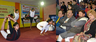 Yoga being performed by the kids and watched by Minister for Health and Medical Education, Ch Lal Singh and other dignitaries in Jammu. Yoga being performed by the kids and watched by Minister for Health and Medical Education, Ch Lal Singh and other dignitaries in Jammu.