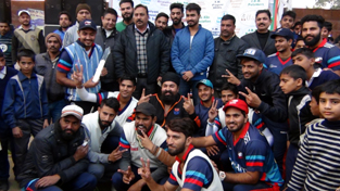Winners showing victory signs while posing for a group photograph at Kathua on Tuesday. Winners showing victory signs while posing for a group photograph at Kathua on Tuesday.