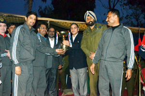 Winners being presented trophy by the chief guest and other dignitaries at Poonch on Friday. Winners being presented trophy by the chief guest and other dignitaries at Poonch on Friday.