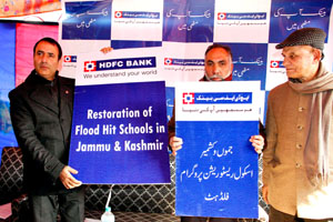 HDFC Bank officials handing over refurbished schools at Srinagar. HDFC Bank officials handing over refurbished schools at Srinagar.