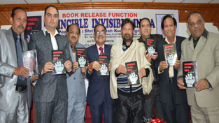 Minister for Health, Ch Lal Singh and others releasing a book at Jammu on Saturday. Minister for Health, Ch Lal Singh and others releasing a book at Jammu on Saturday.