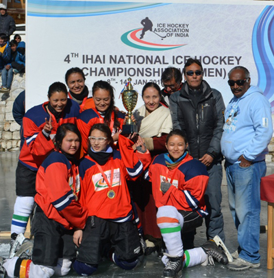 JK Red team posing for a group photograph after lifting the 4th Women National Ice Hockey Trophy at Leh. JK Red team posing for a group photograph after lifting the 4th Women National Ice Hockey Trophy at Leh.