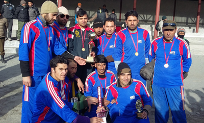 Winners of 7th District Tennis Ball Cricket Championship posing for a group at Kargil on Friday. Winners of 7th District Tennis Ball Cricket Championship posing for a group at Kargil on Friday.