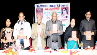 Dignitaries releasing Dogri book ‘Beth Proche Geet Raseela’ at Abhinav Theatre, Jammu on Friday. Dignitaries releasing Dogri book ‘Beth Proche Geet Raseela’ at Abhinav Theatre, Jammu on Friday.