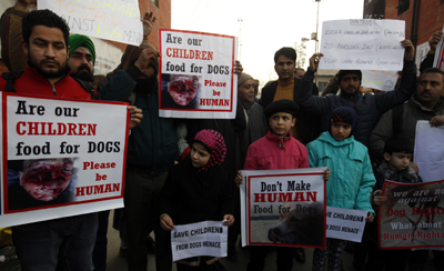 Members of multiple civil rights’ groups and medical associations protesting against rising dog menace at Lal Chowk, Srinagar. — Excelsior/Amin War Members of multiple civil rights’ groups and medical associations protesting against rising dog menace at Lal Chowk, Srinagar. — Excelsior/Amin War
