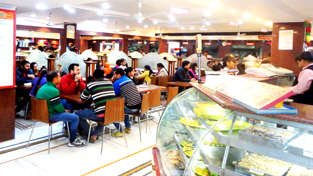 Tourists recreating themselves while taking delicious food at Ganpati Food Junction at Gandhi Nagar in Jammu on Thursday. Tourists recreating themselves while taking delicious food at Ganpati Food Junction at Gandhi Nagar in Jammu on Thursday.