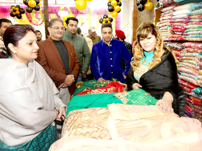 Kavinder Gupta, Priya Sethi and others having glimpse of the products at Kay Tee Designer Studio, Trikuta Nagar. -Excelsior/Rakesh Kavinder Gupta, Priya Sethi and others having glimpse of the products at Kay Tee Designer Studio, Trikuta Nagar. -Excelsior/Rakesh