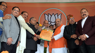 Amit Shah receiving the formal certificate of election as BJP National President from Party Vice President, Avinash Rai Khanna in presence of (Right to Left) Dr Jitendra Singh, Thawar Chand Gehlot, Venkaiah Naidu, Rajnath Singh, Nitin Gadkari, Ananth Kumar, J. P. Nadda and Shivraj Singh Chouhan,at BJP headquarters, New Delhi on Sunday. Amit Shah receiving the formal certificate of election as BJP National President from Party Vice President, Avinash Rai Khanna in presence of (Right to Left) Dr Jitendra Singh, Thawar Chand Gehlot, Venkaiah Naidu, Rajnath Singh, Nitin Gadkari, Ananth Kumar, J. P. Nadda and Shivraj Singh Chouhan,at BJP headquarters, New Delhi on Sunday.