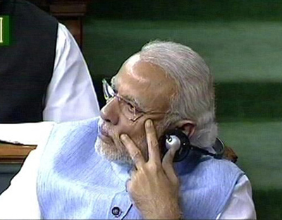 A TV grab shows Prime Minister Narendra Modi listening the speech of Railway Minister Suresh Prabhu presenting the Raiaway Budget for the year 2016-17 at Parliament, in New Delhi on Thursday. (UNI) A TV grab shows Prime Minister Narendra Modi listening the speech of Railway Minister Suresh Prabhu presenting the Raiaway Budget for the year 2016-17 at Parliament, in New Delhi on Thursday. (UNI)