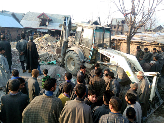 People gather at the site of grenade blast at Hajin, Bandipora on Sunday. People gather at the site of grenade blast at Hajin, Bandipora on Sunday.