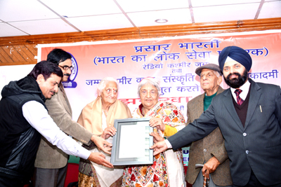 Dignitaries felicitating Krishna Gupta at KL Saigal Hall Jammu. Dignitaries felicitating Krishna Gupta at KL Saigal Hall Jammu.