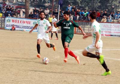 Players in action during a match of Santosh Trophy Football Championship at GGM Science College Football ground on Wednesday. -Excelsior/ Rakesh Players in action during a match of Santosh Trophy Football Championship at GGM Science College Football ground on Wednesday. -Excelsior/ Rakesh