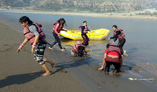 A group of students from Delhi enjoying rafting in River Chenab near Baradari in the care of JK Adventures, 27 Kms from Vaishno Mata ji base camp Katra. (UNI) A group of students from Delhi enjoying rafting in River Chenab near Baradari in the care of JK Adventures, 27 Kms from Vaishno Mata ji base camp Katra. (UNI)