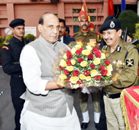 Union Home Minister Rajnath Singh with BSF DG D K Pathak in New Delhi on Friday. Union Home Minister Rajnath Singh with BSF DG D K Pathak in New Delhi on Friday.