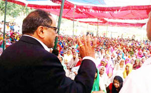 Dr Nirmal Singh addressing gathering at village Mela in district Kathua. Dr Nirmal Singh addressing gathering at village Mela in district Kathua.