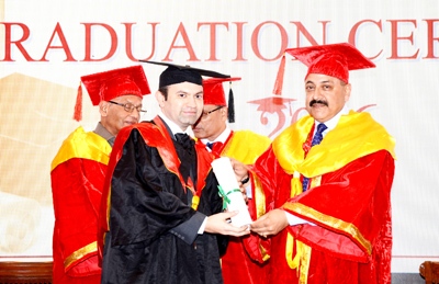 Union Minister Dr Jitendra Singh presenting the degree scroll to one of the recipients during the Graduation ceremony at Tata Memorial Cancer Centre, Mumbai on Thursday. Union Minister Dr Jitendra Singh presenting the degree scroll to one of the recipients during the Graduation ceremony at Tata Memorial Cancer Centre, Mumbai on Thursday.