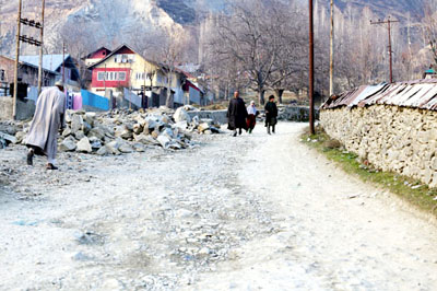 Drangbal road in North Kashmir’s Baramulla district in shambles. -Excelsior/ Aabid Nabi Drangbal road in North Kashmir’s Baramulla district in shambles. -Excelsior/ Aabid Nabi