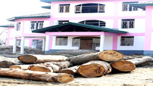 Timber recovered by police on Sunday. -Excelsior/ Aabid Nabi Timber recovered by police on Sunday. -Excelsior/ Aabid Nabi