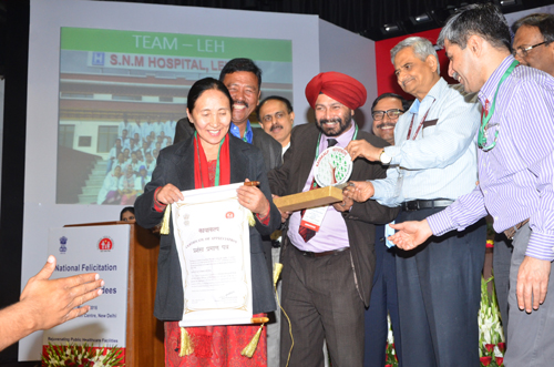 Union Health Secretary D P Sharma and others presenting ‘Kayakalp’ award to NHM Director Dr Mohan Singh and CMO Leh Dr. Yangchen Dolma in New Delhi on Wednesday. Union Health Secretary D P Sharma and others presenting ‘Kayakalp’ award to NHM Director Dr Mohan Singh and CMO Leh Dr. Yangchen Dolma in New Delhi on Wednesday.