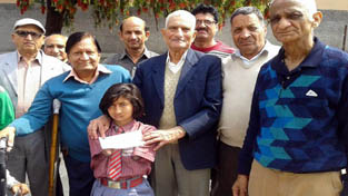 An official of HPS presenting cheque to a handicapped girl of JRC Home, Udheywala, Jammu. An official of HPS presenting cheque to a handicapped girl of JRC Home, Udheywala, Jammu.